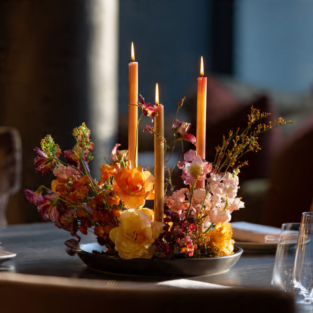 a low candle arrangement on a table