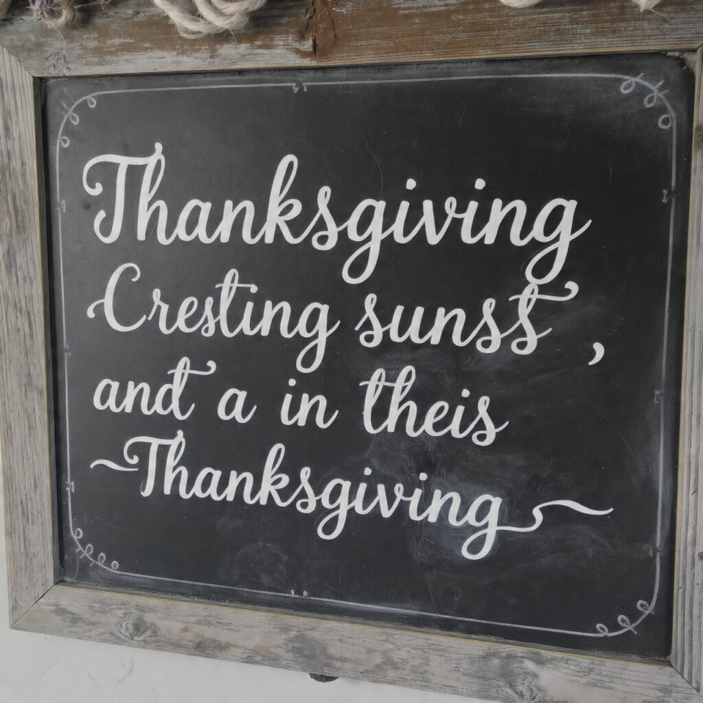 a thanksgiving chalkboard featuring a handwritten blessing
