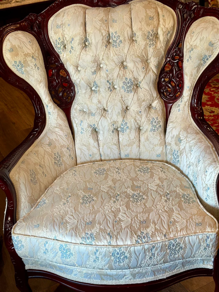 29 Cozy Reading Nook Ideas That Turn Any Corner Into a Relaxing Escape You'll Never Want to Leave 2 A Deep Armchair With Wide Arms