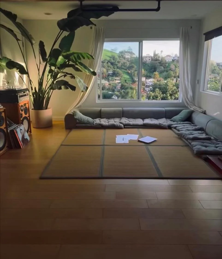 29 Cozy Reading Nook Ideas That Turn Any Corner Into a Relaxing Escape You'll Never Want to Leave 4 A Floor-Level Cushion Setup