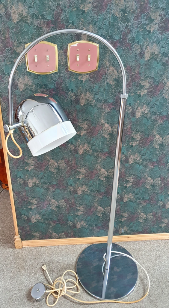 29 Cozy Reading Nook Ideas That Turn Any Corner Into a Relaxing Escape You'll Never Want to Leave 8 An Adjustable Arc Floor Lamp