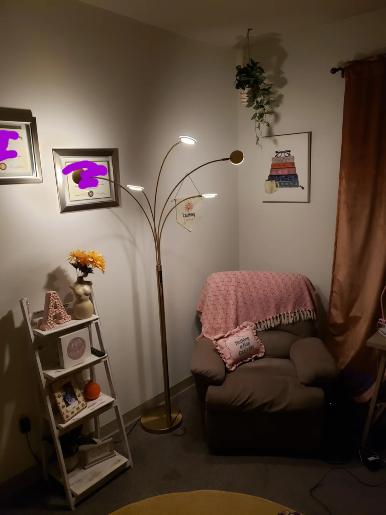 26 Apartment Reading Nook Ideas That Make Small Spaces Feel Warm, Stylish, and Super Cozy 4 A Papasan Chair in the Living Room Corner