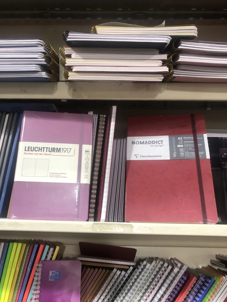 26 Apartment Reading Nook Ideas That Make Small Spaces Feel Warm, Stylish, and Super Cozy 26 A Notebook and Pen Within Reach