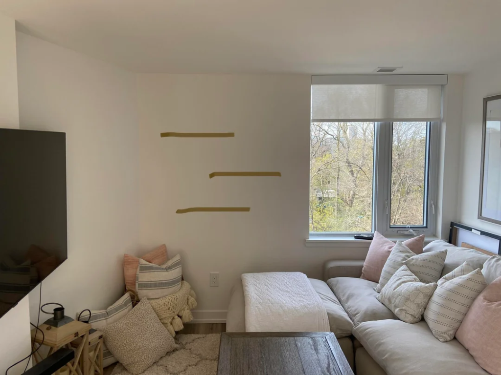 Three Stacked Floating Shelves at Varied Heights