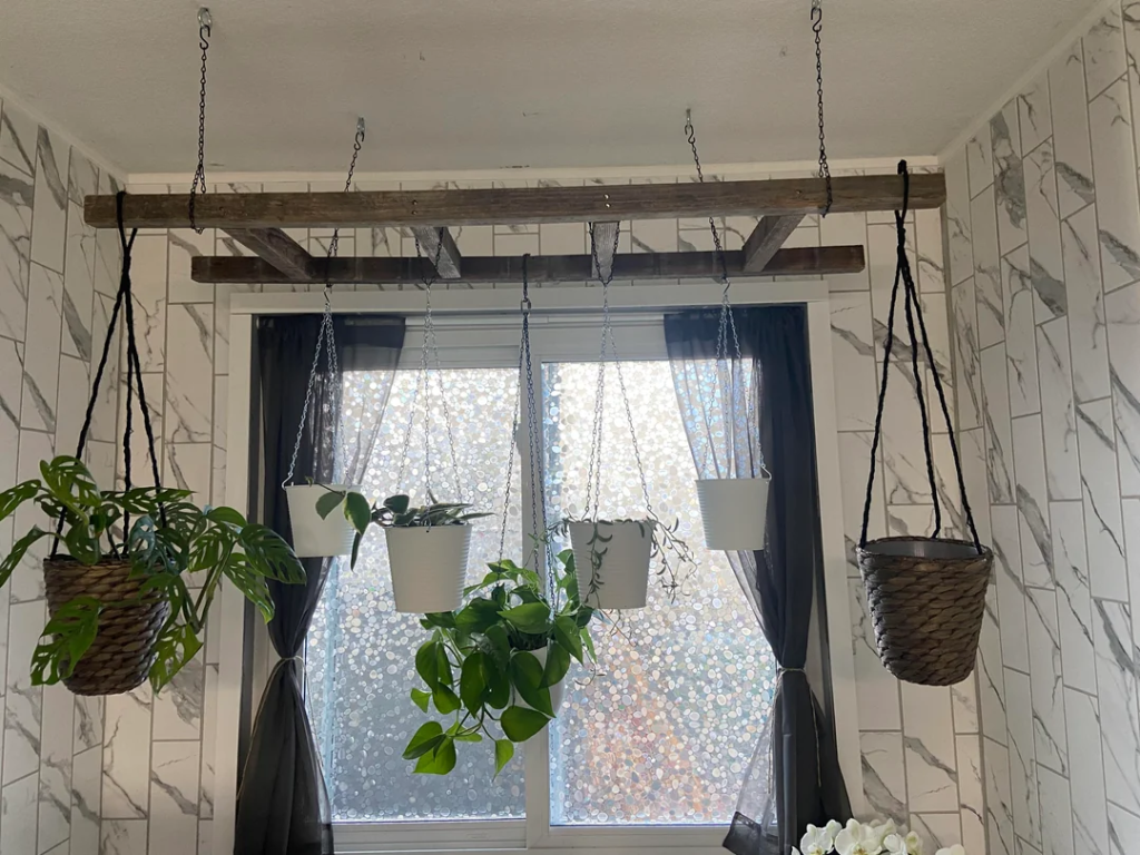 28 Small Space Plant Decor Ideas That Maximize Greenery and Make Your Home Feel Fresh and Alive 19 A Plant Ladder in a Bathroom Corner