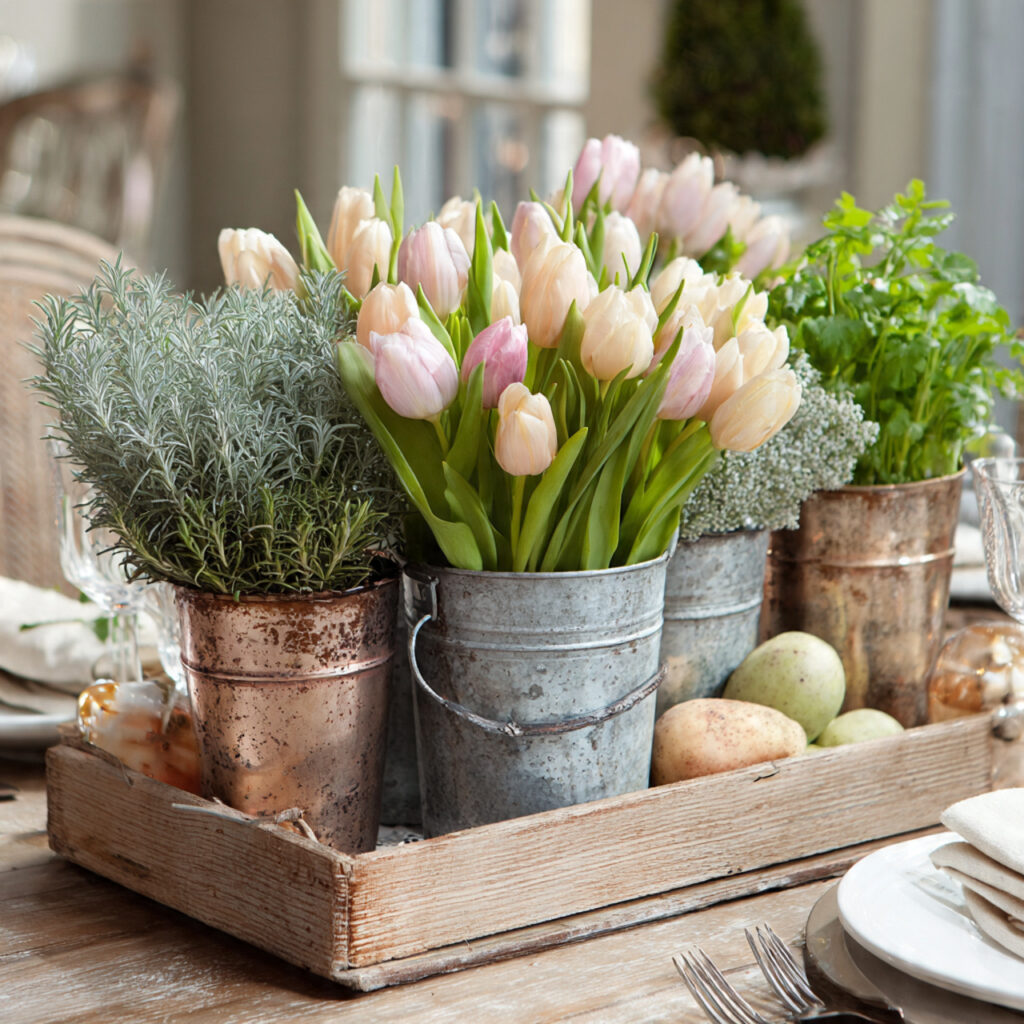 19 April Showers Table Decorations That Create a Fresh Rainy Spring Theme Start Styling Your Table Today 15 Galvanized Metal Bucket Centerpiece With Tulips and Rain Drops