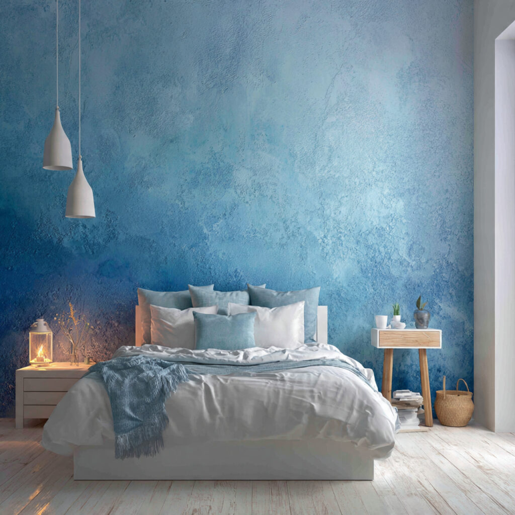 Blue Ombre Gradient Wall With Layered White and Blue Bedding